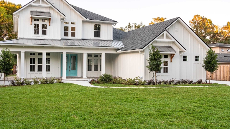 White house with green grass.