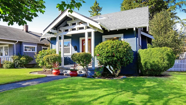 Residential home with beautiful green lawn.