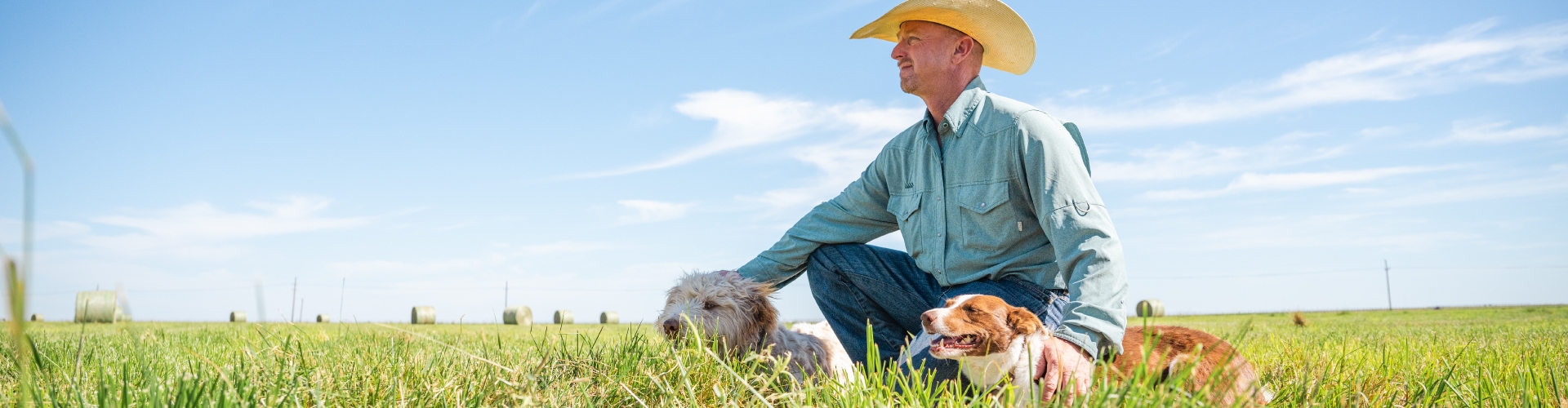 Rancher with two dogs.