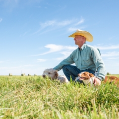Rancher with two dogs.
